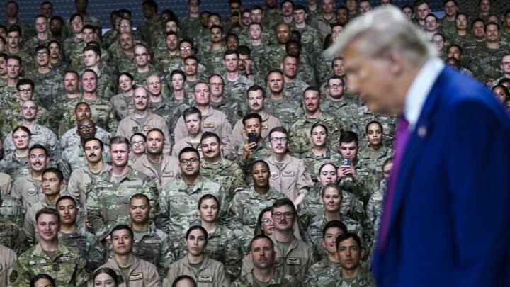 US President Donald Trump arrives to address troops at the Al-Udeid air base southwest of Doha on May 15, 2025. 