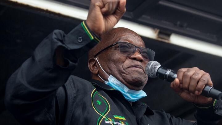 Former South African president Jacob Zuma addresses his supporters in front of his rural home in Nkandla on July 4, 2021, after he was given a 15-months sentence for contempt of court.