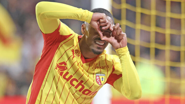 Lens French forward #22 Wesley Said celebrates scoring the second goal during the French L1 football match between RC Lens and FC Lorient at the Stade Bollaert-Delelis in Lens, northern France, on Nov