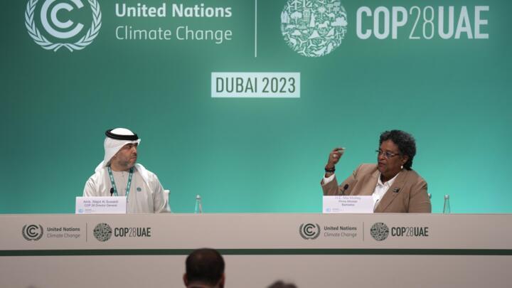COP28 Director-General Ambassador Majid Al Suwaidi, left, and Barbados Prime Minister Mia Mottley at a news conference at the COP28 summit on December 4, 2023, in Dubai.