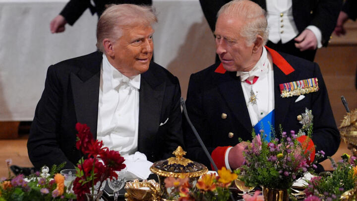 US President Donald Trump and Britain's King Charles III attend a state banquet at Windsor Castle on September 17, 2025.