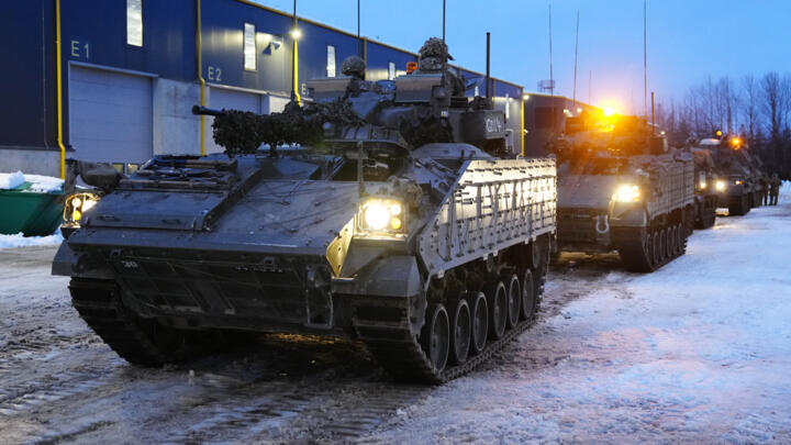 Britain's armoured vehicles prepare to move at the Tapa Military Camp in Estonia on January 19, 2023.