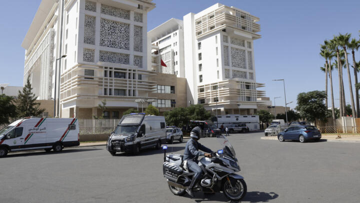 A Moroccan National Security force awaits in front of the Court of First Instance in Rabat where feminist activist Ibtissame Lachgar was brought on August 12, 2025.