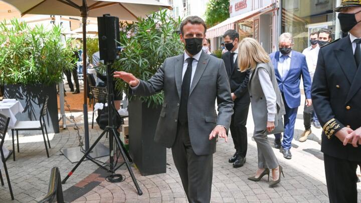 French President Emmanuel Macron arrives for a lunch in Valence on June 8, 2021, during a visit to the French department of Drôme, site of the infamous slap.