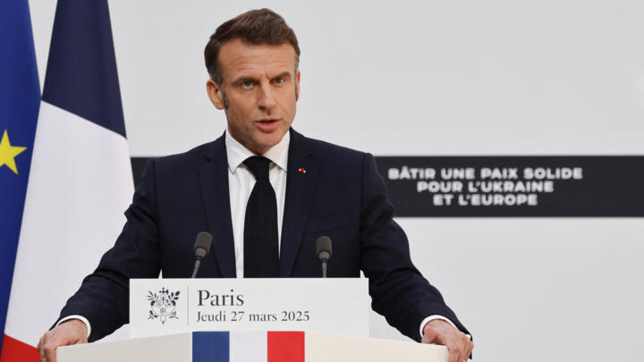 France's President Emmanuel Macron speaks during a press conference following a summit for "coalition of the willing" at the Elysee Palace, in Paris, on March 27, 2025.