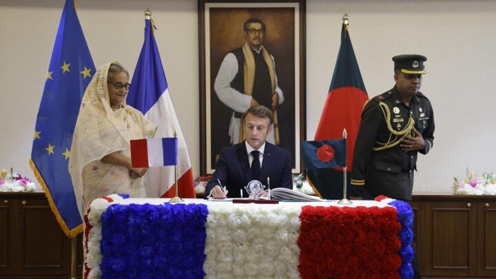 French President Emmanuel Macron pictured with Bangladesh's Prime Minister Sheikh Hasina (left) in her office in Dhaka, Bangladesh on September 11, 2023.