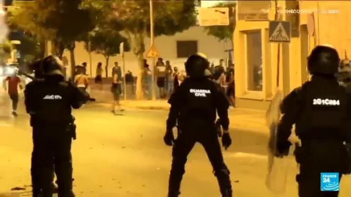 Far-right groups and migrants clash in southeastern Spain town