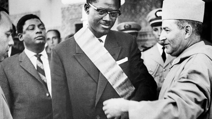The King of Morocco Mohamed V presents the Grand Cordon of the Order of the Throne to the Prime Minister of Congo Patrice Lumumba on August 08, 1960 during his official visit to Morocco.