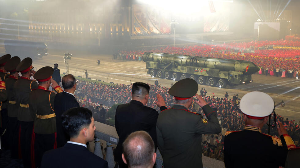Kim oversees N. Korea military parade showcasing new drones, ICBMs