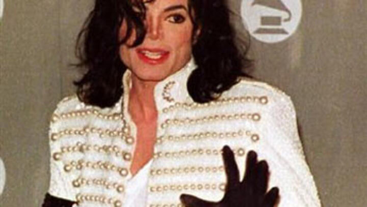 Singer's glove fetches $49,000 in Australia