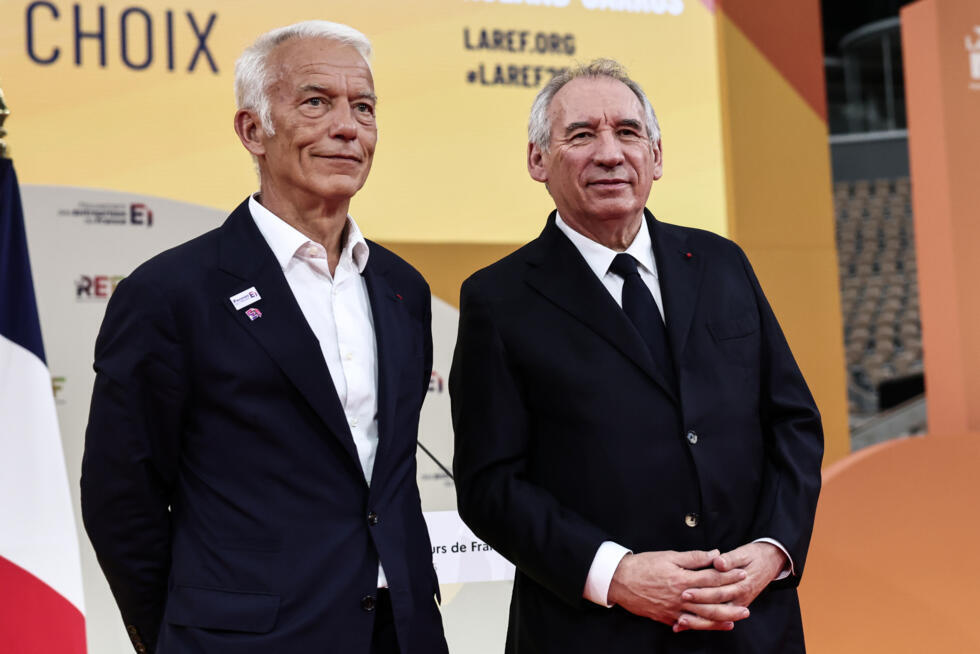 Le Premier ministre François Bayrou  (D) et le président du Medef Patrick Martin le 28 août 2025 lors de l'événement de rentrée du Medef à Paris