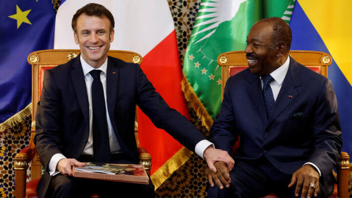 French President Emmanuel Macron meets with Gabon's President Ali Bongo Ondimba at the Presidential Palace in Libreville on March 1, 2023.