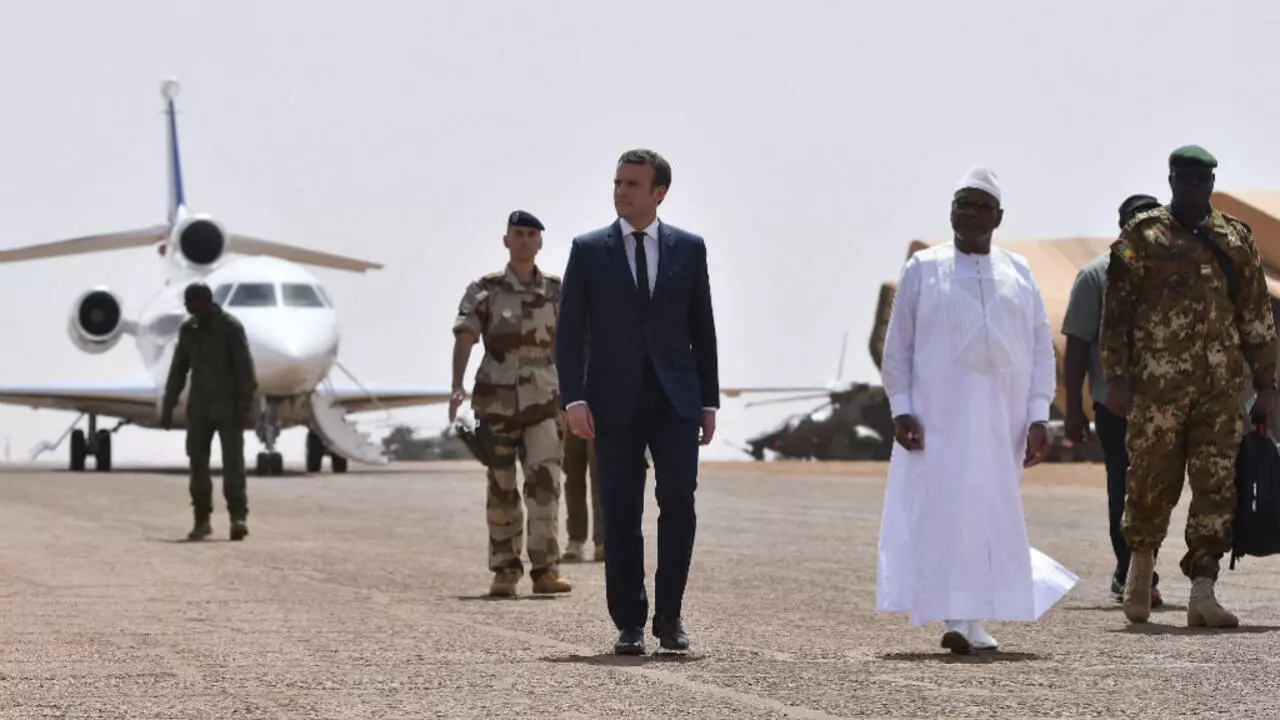Macron vows 'uncompromising' fight against Mali Islamists on visit to French troops