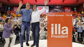 Spanish Prime Minister Pedro Sanchez, left, and Catalan Socialist Party candidate Salvador Illa during a rally on May 10, 2024, in Barcelona ahead of the regional elections in Catalonia