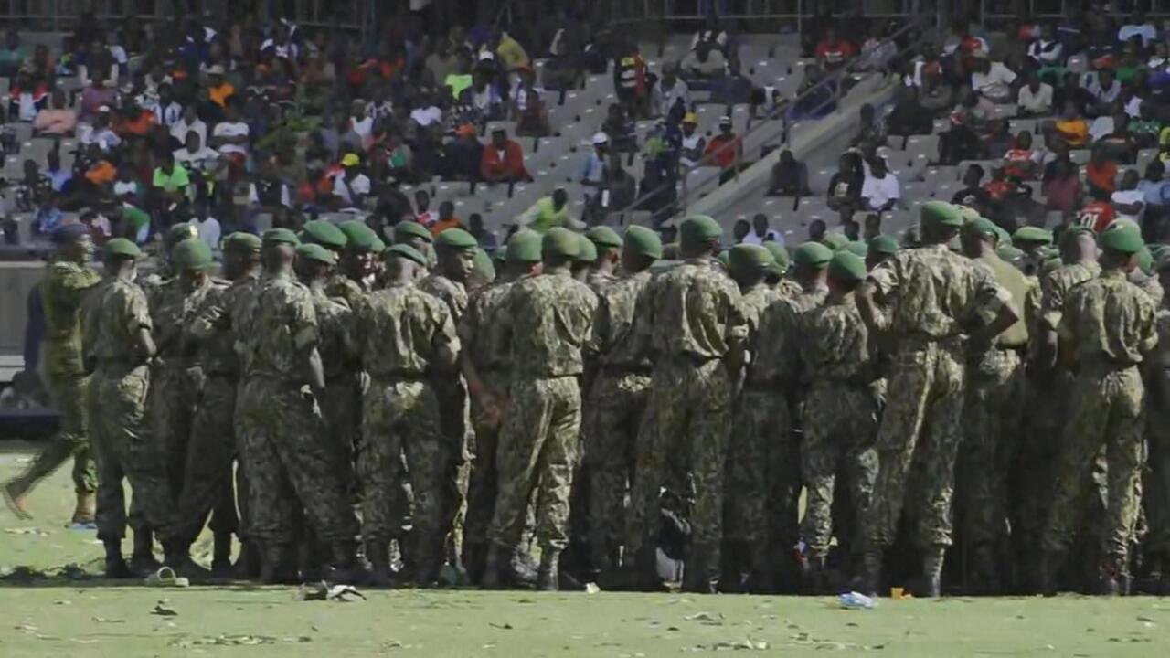 Kenyan police fire tear gas at mourners during former PM Odinga's public viewing