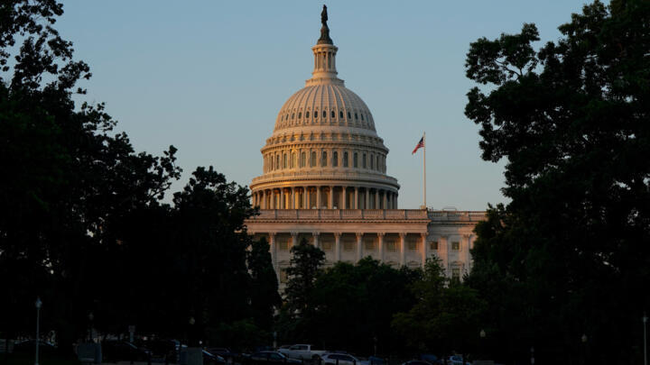 A view of the US Capitol building after sunrise as clerks continue to read aloud US President Donald Trump's 940-page spending and tax bill in the Senate chamber on Capitol Hill in Washington, DC, US,
