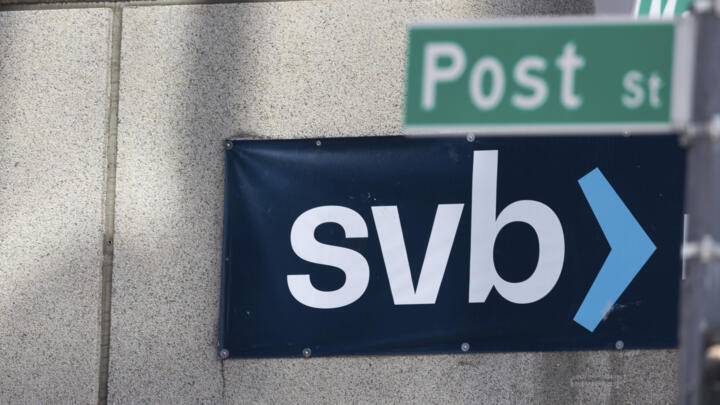 The Silicon Valley Bank sign hangs above one of its branches in San Jose, CA, on March 13, 2023.
