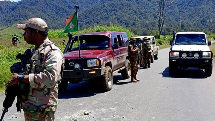This handout picture released by the Royal Papua New Guinea Constabulary on February 19, 2024 shows officials patrolling near the town of Wabag.