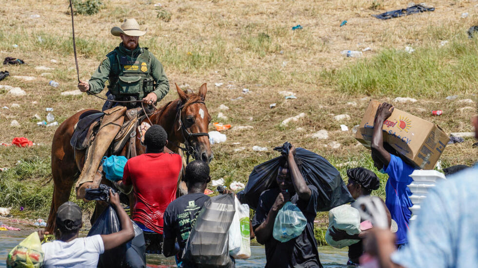 US to investigate reported abuse of Haitian migrants by mounted border