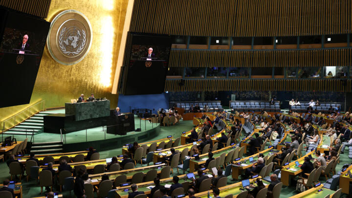 Palestinian Ambassador to the United Nations Riyad Mansour (at podium) speaks during a meeting of the UN General Assembly at UN Headquarters in New York City on June 12, 2025