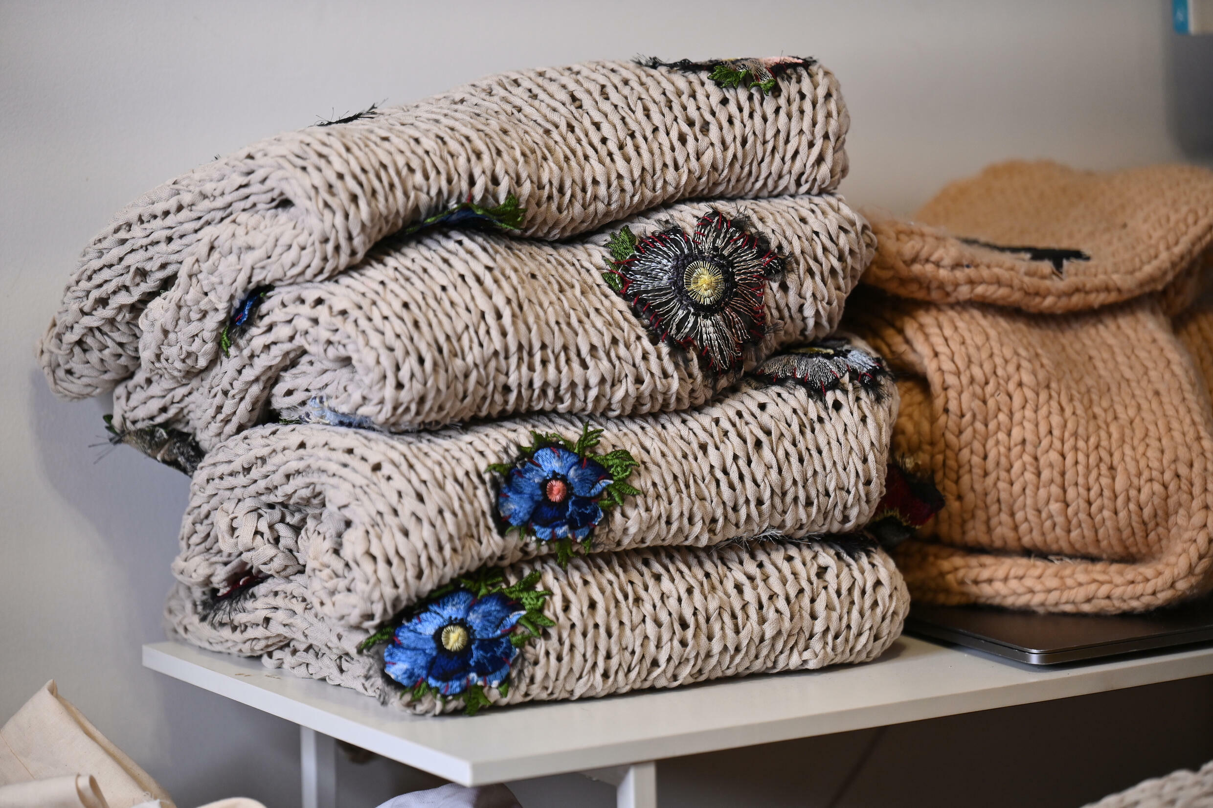 Sweaters made from recycled materials at designer Emma Gage's studio in Brooklyn