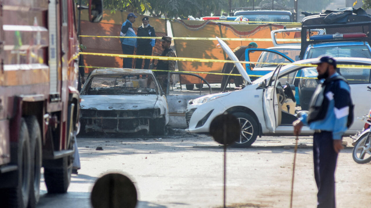 Suicide bomber kills at least a dozen people outside court in Pakistan's capital