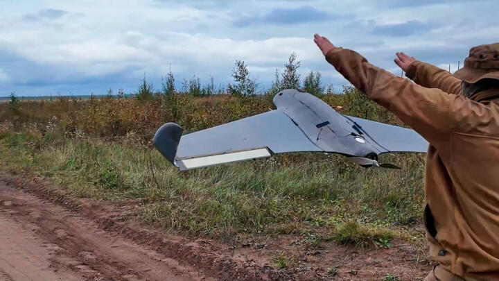 A Russian soldier launches a drone in an undisclosed location in Ukraine in this photo taken from video distributed by Russian Defense Ministry Press Service on Tuesday, September 30, 2025.