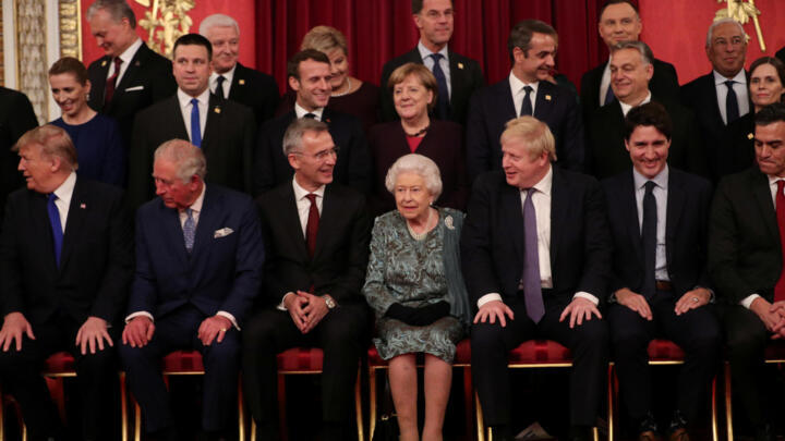 Leaders of NATO alliance countries and Secretary General Jens Stoltenberg join Britain's Queen Elizabeth, Prince Charles, Prime Minister Boris Johnson, US President Donald Trump, German Chancellor Angela Merkel, French President Emmanuel Macron and Canadian Prime Minister Justin Trudeau for a group picture as they gather for to mark 70 years of NATO Alliance during a reception at Buckingham Palace, London, Britain, December 3, 2019.
