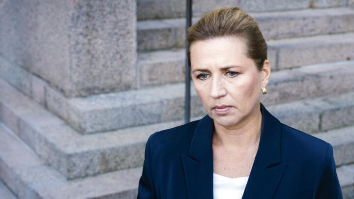 Danish Prime Minister Mette Frederiksen looks on during a press statement to comment on drone activity at Copenhagen Airport in Copenhagen on September 23, 2025.