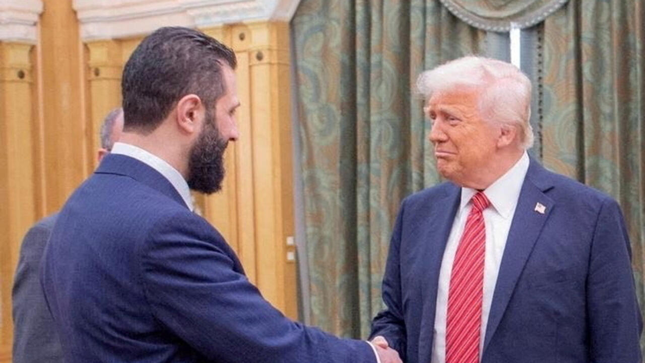 FILE PHOTO: U.S. President Donald Trump meets with Syrian President Ahmed al-Sharaa in Riyadh