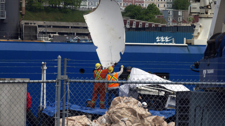 Debris from the Titan submersible is unloaded from the ship Horizon Arctic at the Canadian Coast Guard pier in St. John's, Newfoundland, Wednesday, June 28, 2023.