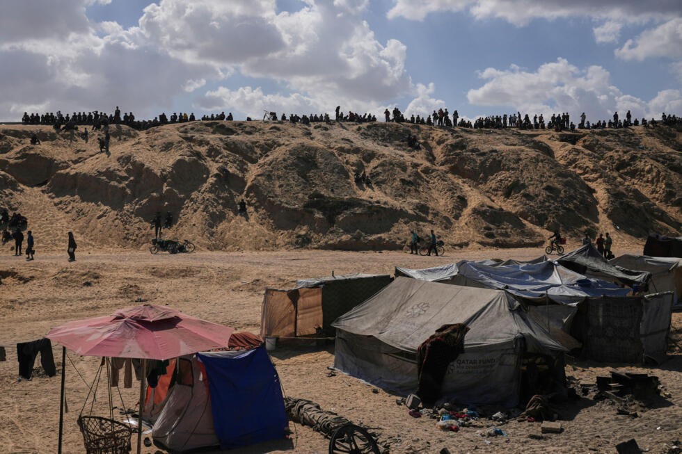 Makeshift tents along the coastal road near Wadi Gaza in the central Gaza Strip.