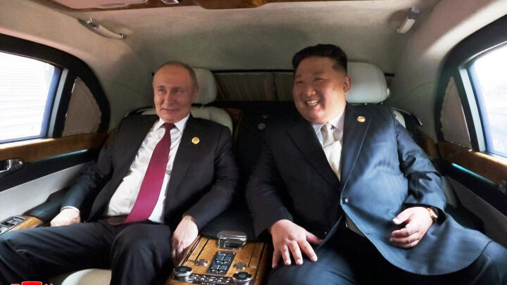 Russian President Vladimir Putin and North Korean leader Kim Jong Un seated in a vehicle during their visit to Beijing to attend the commemoration of the 80th anniversary of the end of World War II, o