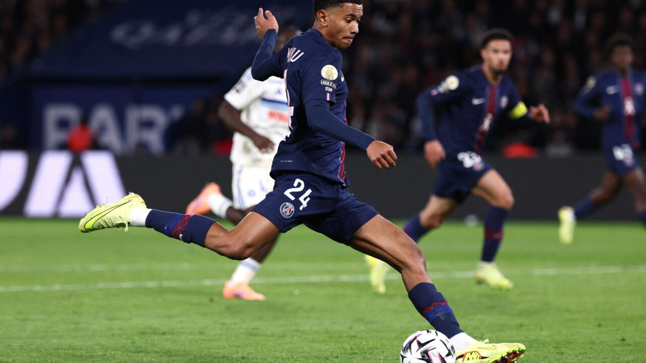 Paris Saint-Germain's French midfielder #24 Senny Mayulu (C) shoots towards goal during the French L1 football match between Paris Saint-Germain (PSG) and RC Strasbourg Alsace at the Parc des Princes Stadium in Paris on October 17, 2025.
FRANCK FIFE / AFP