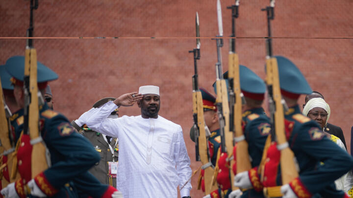 Mali's junta leader Assimi Goita attends a wreath-laying ceremony at the Tomb of the Unknown Soldier near the Kremlin wall in Moscow on June 23, 2025. 