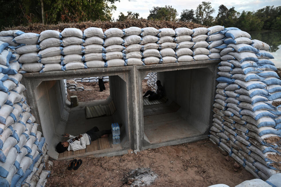 Displaced residents rest in a bunker in Thailand's Surin province