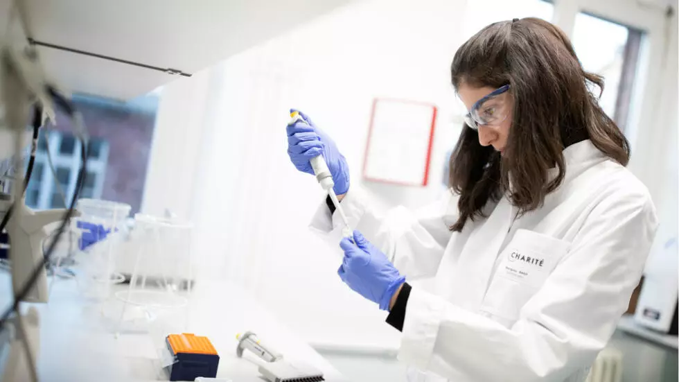 An employee of the virology department of the Charité hospital prepares a test for the new coronavirus in Berlin, Germany on January 21, 2020.