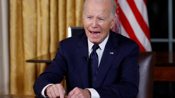 US President Joe Biden delivers a prime-time address to the nation about his approaches to the conflict between Israel and Hamas, humanitarian assistance in Gaza and continued support for Ukraine in their war with Russia, from the Oval Office of the White House in Washington, October 19, 2023.