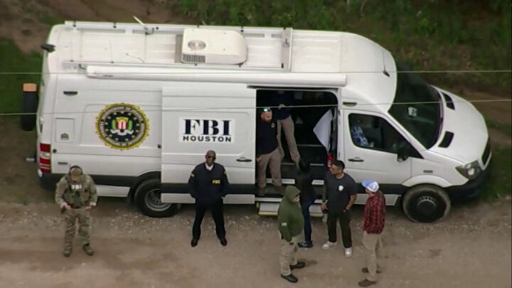 This still image from video shows a Federal Bureau of Investigation (FBI) van at the location of a search being conducted for Francisco Oropeza, 38, who police say shot dead five neighbors in Cleveland, Texas, April 29, 2023.