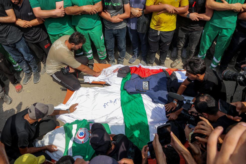 Mourners bid farewell to the bodies of the Al Jazeera journalists who were killed in an overnight Israeli strike on their tent in Gaza City on August 11, 2025.