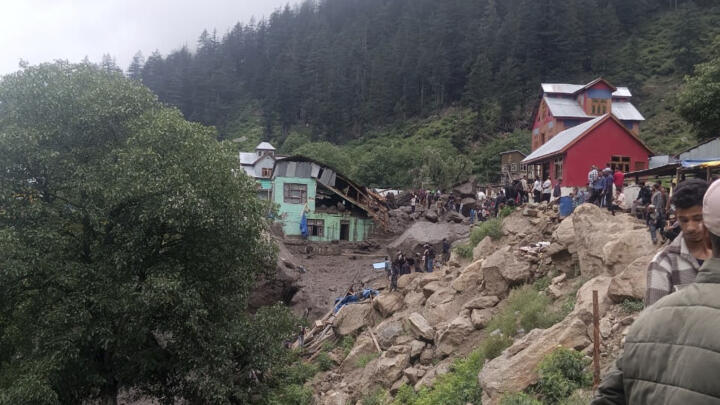 Buildings damaged in flash floods caused by torrential rains are seen in a remote, mountainous village, in Chositi area, Indian controlled Kashmir, Thursday, Aug. 14, 2025. 