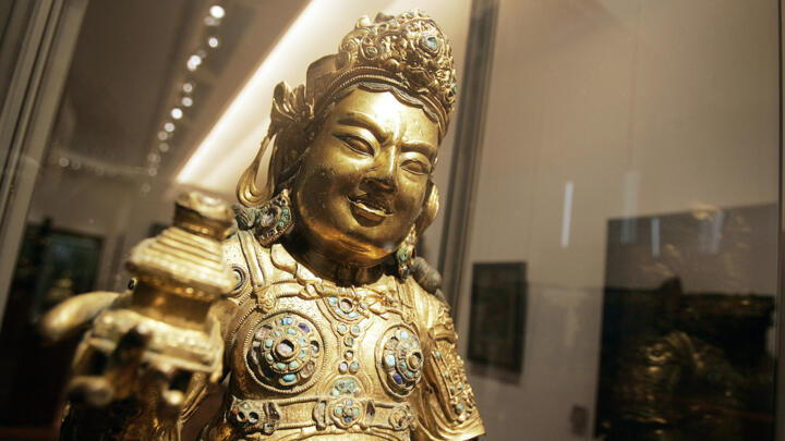 A Tibetan statue representing the Buddhist deity Virupaksa seen at the Musée Guimet in Paris.