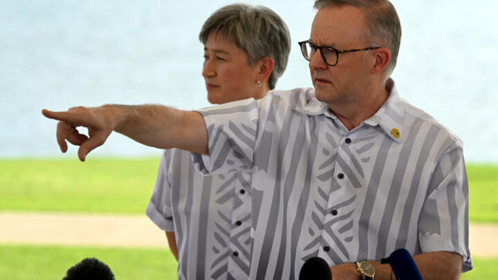 Australian Prime Minister Anthony Albanese (R) and Foreign Minister Penny Wong (L) speak during a press conference at the Pacific Islands Forum in Suva on July 13, 2022. 