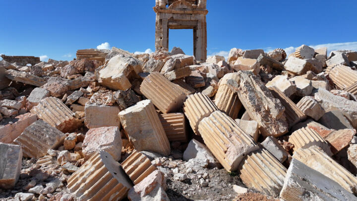 In this file photo, American soldiers drive a Bradley fighting vehicle during a joint exercise with Syrian Democratic Forces in the countryside of Deir Ezzor in northeastern Syria on Wednesday, Decemb