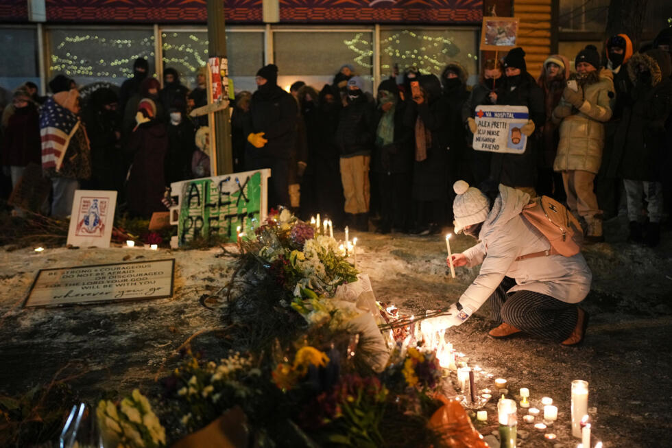 People gather during a vigil for Alex Pretti, who was fatally shot by a US Border Patrol officer earlier in the day on Saturday, January 24, 2026, Minneapolis