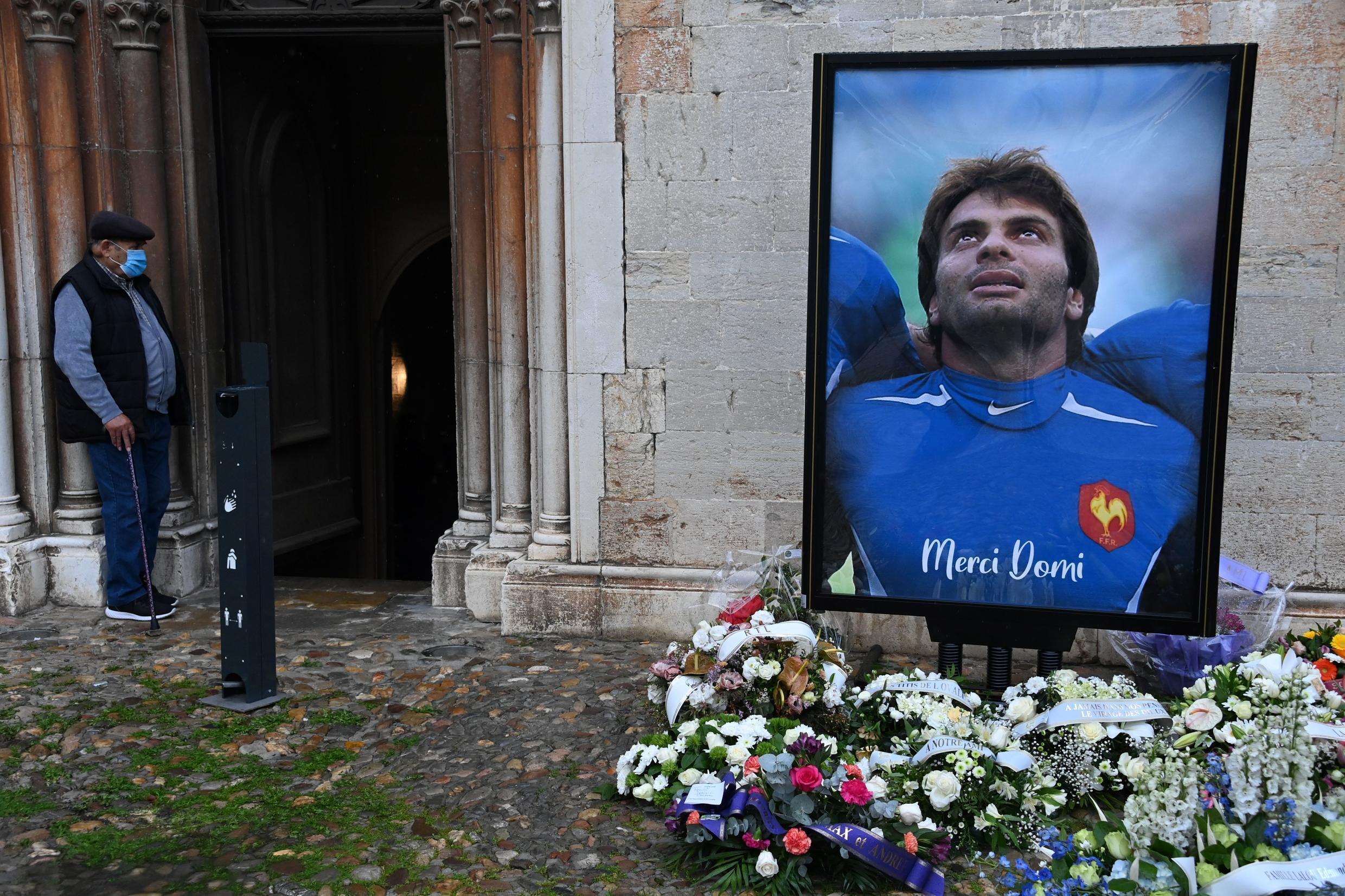 A portrait of French rugby star Christophe Dominici at his funeral in Hyères on December 4.