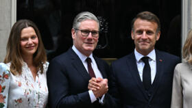 French President Emmanuel Macron and his wife Brigitte Macron pose with British PM Keir Starmer and his wife Victoria Starmer at 10 Downing Street, London, July 9, 2025.
