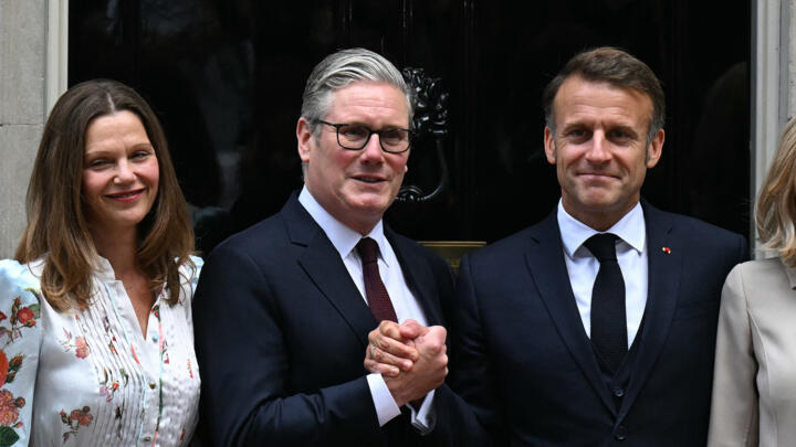 French President Emmanuel Macron and his wife Brigitte Macron pose with British PM Keir Starmer and his wife Victoria Starmer at 10 Downing Street, London, July 9, 2025.