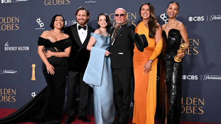 French director Jacques Audiard and actors Selena Gomez, Karla Sofia Gascon and Zoe Saldana pose with the Best Motion Picture - Musical or Comedy award for "Emilia Perez" in on January 5, 2025.
