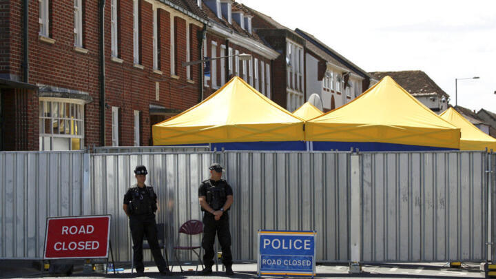File photo of police officers on duty in Salisbury, England during the investigation into the death of Dawn Sturgess taken July 10, 2018.